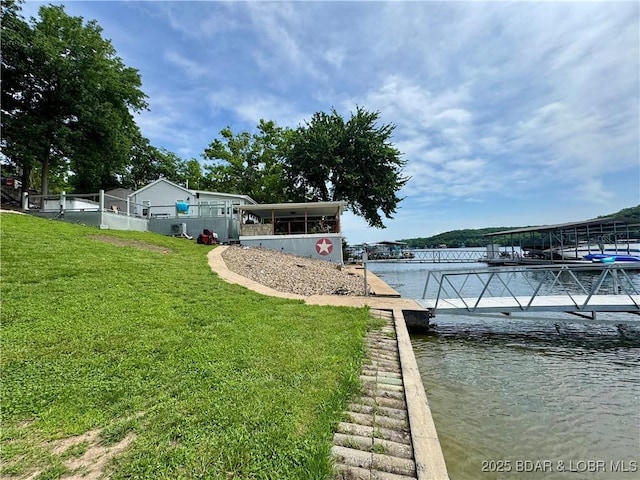 27638 Golden Point Ln, Barnett, MO 65011 - dock area with a water view and a lawn