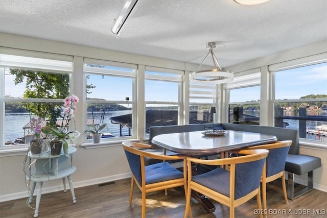 27638 Golden Point Ln, Barnett, MO 65011 - sunroom / solarium featuring a water view and healthy amount of natural light