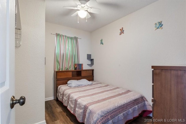 27638 Golden Point Ln, Barnett, MO 65011 - bedroom with wood finished floors and a ceiling fan