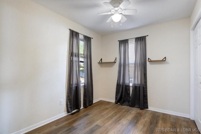 27638 Golden Point Ln, Barnett, MO 65011 - spare room featuring a ceiling fan and wood finished floors