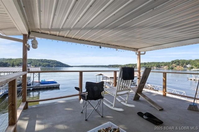 27638 Golden Point Ln, Barnett, MO 65011 - view of patio featuring a water view