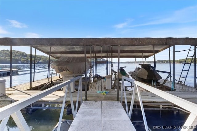 27638 Golden Point Ln, Barnett, MO 65011 - dock area featuring boat lift and a water view