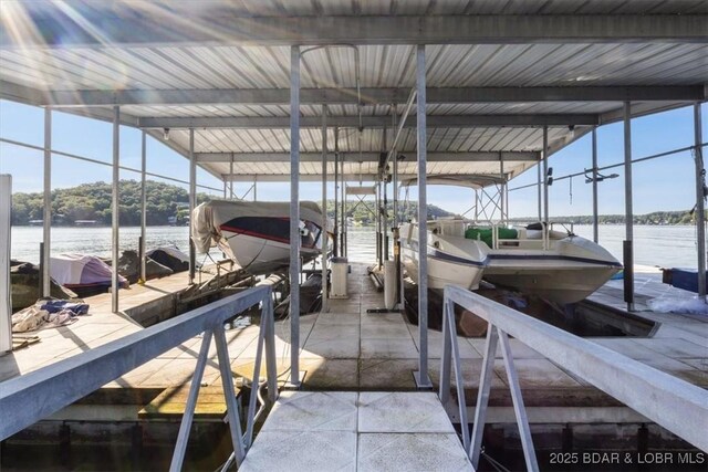 27638 Golden Point Ln, Barnett, MO 65011 - dock with boat lift and a water view