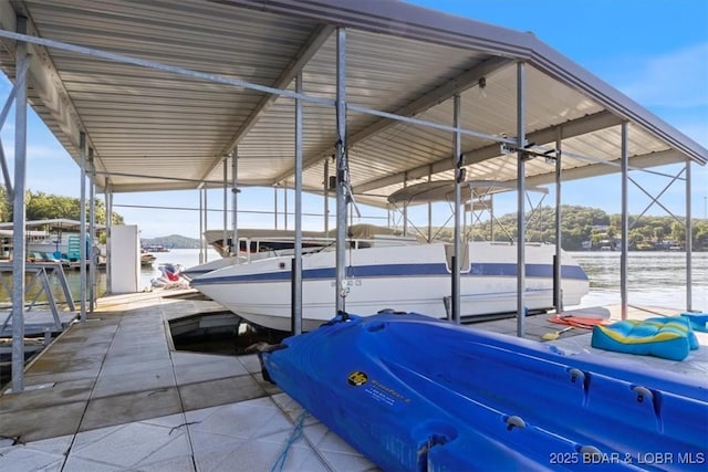 27638 Golden Point Ln, Barnett, MO 65011 - view of vehicle parking with a water view, a floating dock, and boat lift
