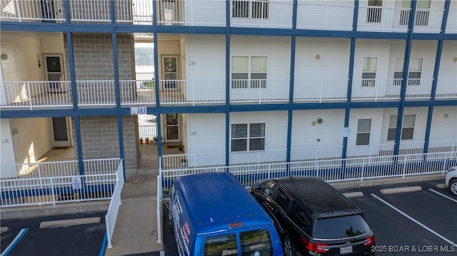 183 Upper Monarch Cove Dr Unit 3D, Lake Ozark, MO 65049 - view of property featuring uncovered parking