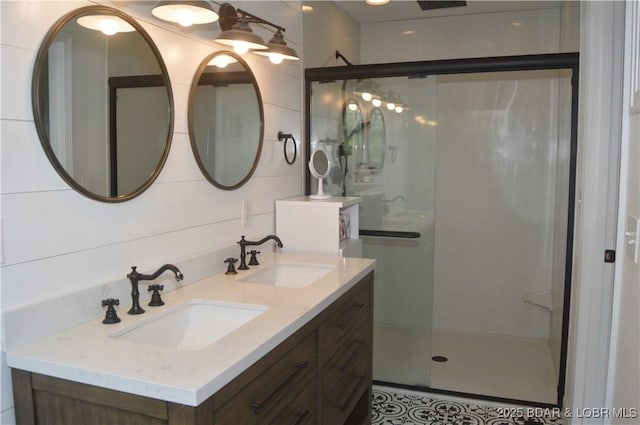 21 Winston Ln, Kaiser, MO 65047 - bathroom featuring a shower stall and double vanity