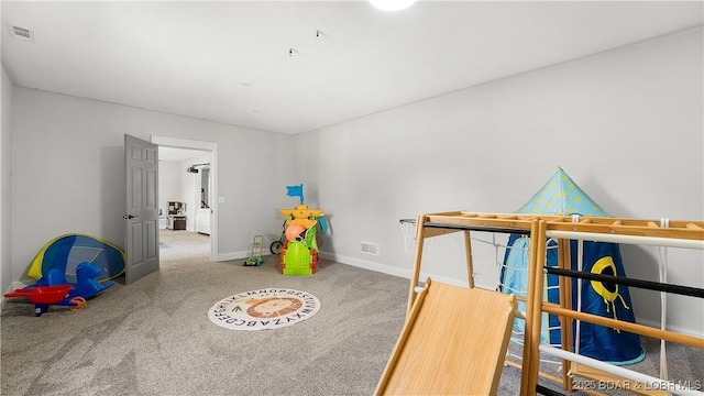 21 Winston Ln, Kaiser, MO 65047 - recreation room featuring baseboards and carpet