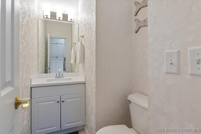 26 Port Bagnell Rd, Eldon, MO 65026 - half bathroom with toilet and vanity