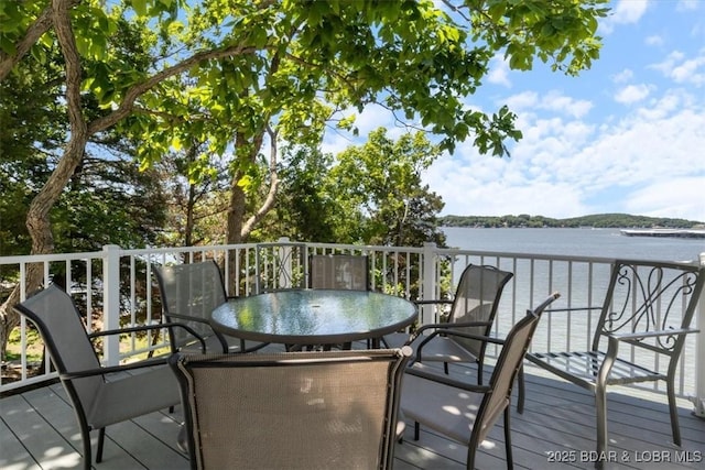 26 Port Bagnell Rd, Eldon, MO 65026 - deck featuring a water view and outdoor dining area