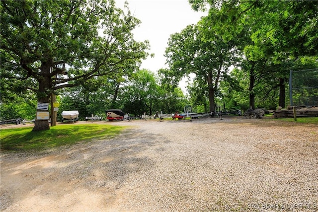 1442 Nichols Rd Unit D301, Osage Beach, MO 65065 - view of road featuring view of wooded area