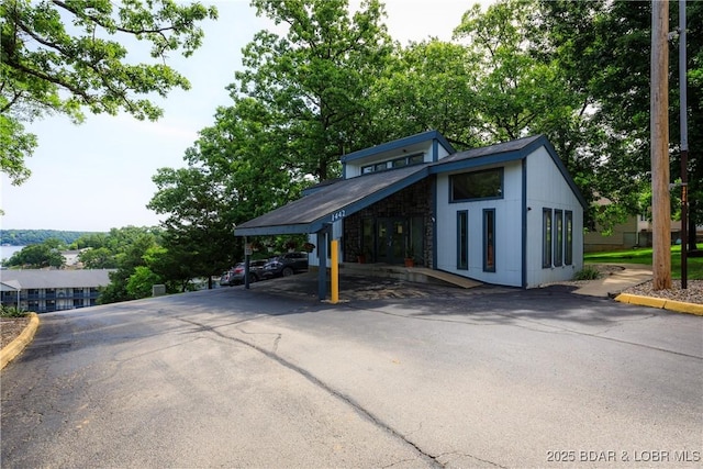 1442 Nichols Rd Unit D301, Osage Beach, MO 65065 - view of vehicle parking with driveway