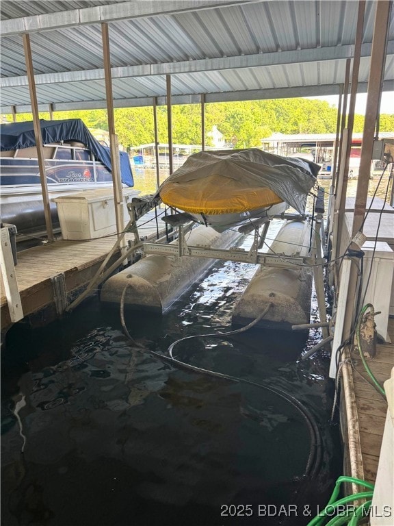 1442 Nichols Rd Unit D301, Osage Beach, MO 65065 - dock area with boat lift
