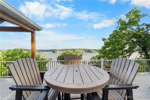 584 Black Hawk Dr, Lake Ozark, MO 65049 - deck with outdoor dining area and a water view