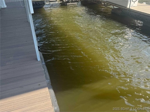 584 Black Hawk Dr, Lake Ozark, MO 65049 - dock featuring a water view