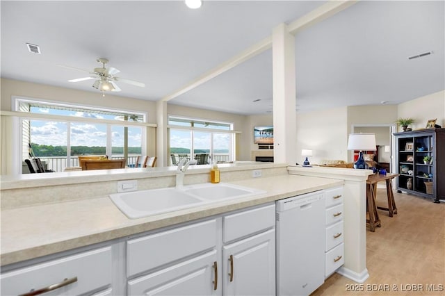 5450 Christopher Ln Unit 211, Osage Beach, MO 65065 - kitchen featuring dishwasher, white cabinetry, a ceiling fan, light wood-type flooring, and light countertops