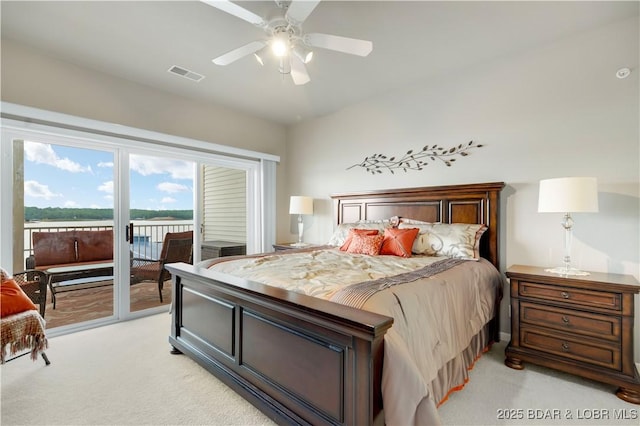 5450 Christopher Ln Unit 211, Osage Beach, MO 65065 - bedroom with light carpet, access to outside, and a ceiling fan