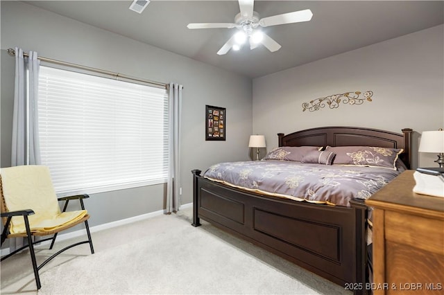 5450 Christopher Ln Unit 211, Osage Beach, MO 65065 - bedroom with light colored carpet and a ceiling fan