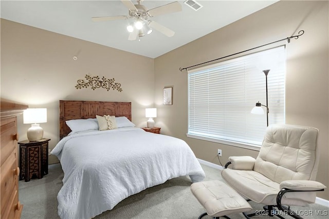 5450 Christopher Ln Unit 211, Osage Beach, MO 65065 - carpeted bedroom featuring baseboards and ceiling fan