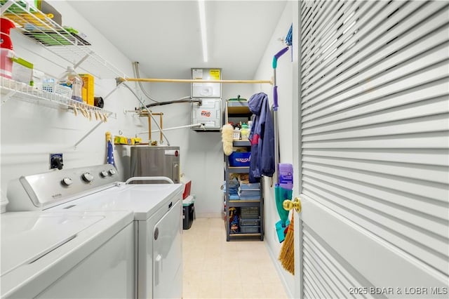 5450 Christopher Ln Unit 211, Osage Beach, MO 65065 - laundry area with separate washer and dryer and electric water heater