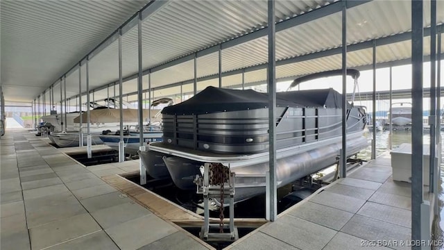 5450 Christopher Ln Unit 211, Osage Beach, MO 65065 - dock area with boat lift and a water view