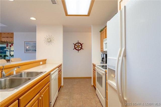 49 Aqua Fin Dr Unit 3B, Lake Ozark, MO 65049 - kitchen with white appliances, light countertops, and light tile patterned flooring