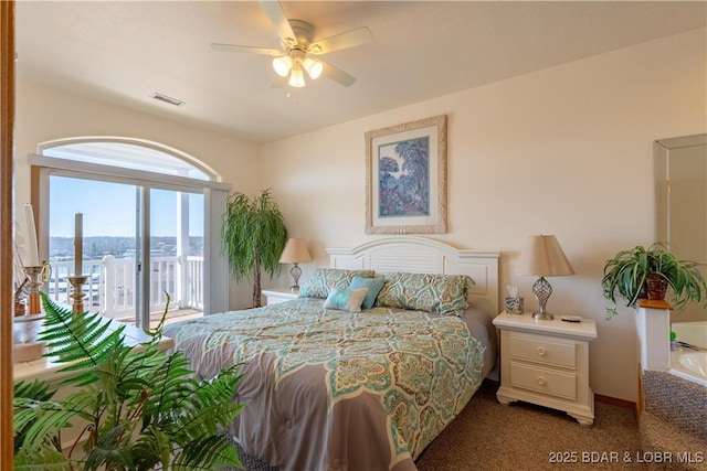 49 Aqua Fin Dr Unit 3B, Lake Ozark, MO 65049 - bedroom featuring access to outside, carpet flooring, and a ceiling fan