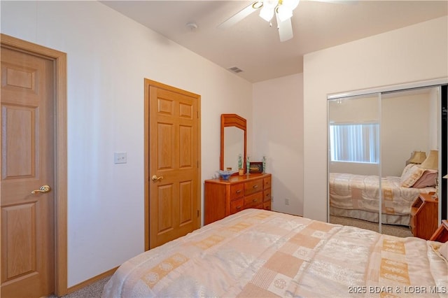 49 Aqua Fin Dr Unit 3B, Lake Ozark, MO 65049 - bedroom with a closet and a ceiling fan