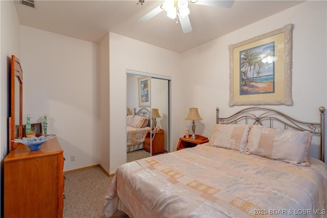 49 Aqua Fin Dr Unit 3B, Lake Ozark, MO 65049 - carpeted bedroom featuring a closet and ceiling fan