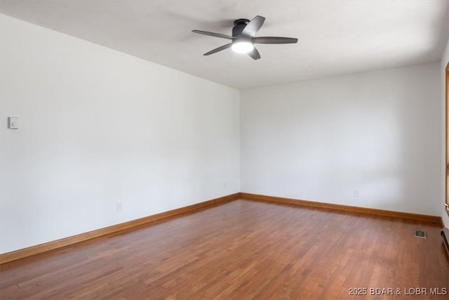 43 Bob White Ln, Lake Ozark, MO 65049 - unfurnished room featuring wood finished floors and ceiling fan