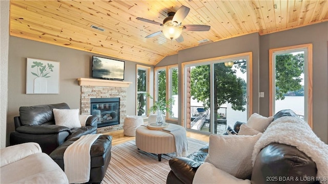 15350 Red Hollow Rd, Gravois Mills, MO 65037 - living area featuring wooden ceiling, ceiling fan, wood finished floors, a fireplace, and vaulted ceiling