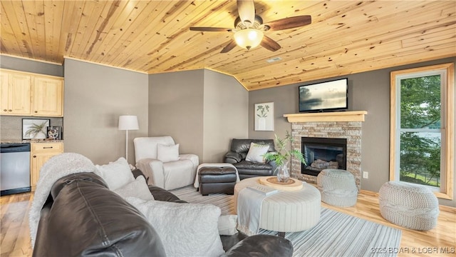 15350 Red Hollow Rd, Gravois Mills, MO 65037 - living room with wood ceiling, light wood-type flooring, ceiling fan, a glass covered fireplace, and vaulted ceiling