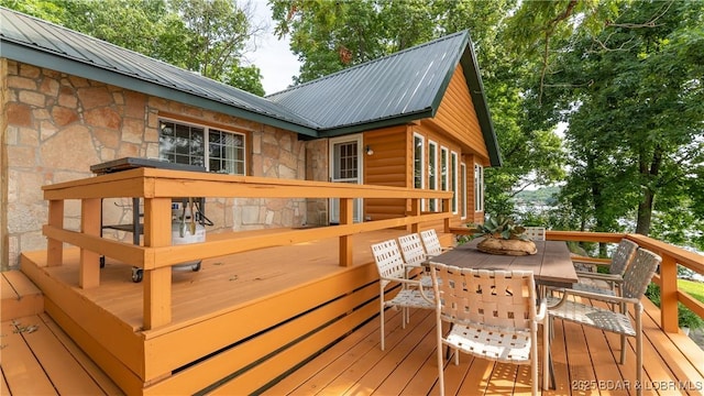 15350 Red Hollow Rd, Gravois Mills, MO 65037 - wooden terrace with outdoor dining area