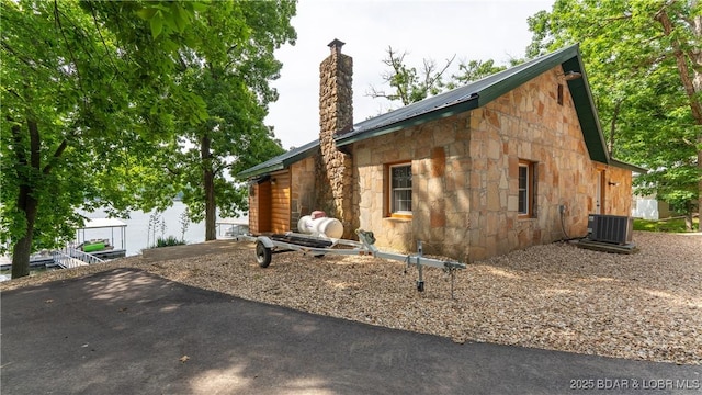 15350 Red Hollow Rd, Gravois Mills, MO 65037 - view of side of property featuring stone siding and a chimney