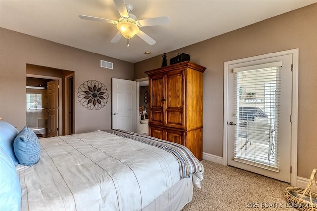 730 Flame Dr Unit 3C, Camdenton, MO 65020 - bedroom featuring multiple windows, light colored carpet, a ceiling fan, and ensuite bathroom