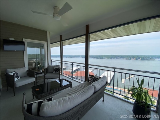 42 Palisades Lakeview Dr Unit 4B, Lake Ozark, MO 65049 - balcony featuring an outdoor living space, a water view, and a ceiling fan