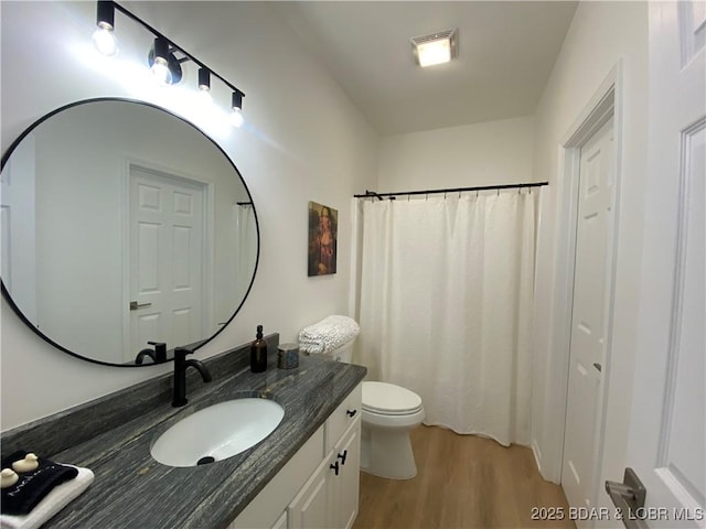42 Palisades Lakeview Dr Unit 4B, Lake Ozark, MO 65049 - bathroom with wood finished floors, vanity, and curtained shower