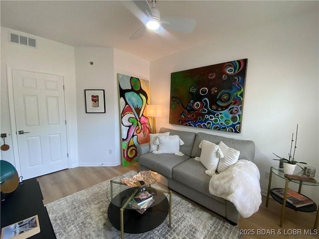 42 Palisades Lakeview Dr Unit 4B, Lake Ozark, MO 65049 - living area with wood finished floors and ceiling fan