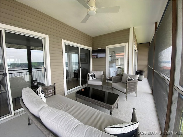 42 Palisades Lakeview Dr Unit 4B, Lake Ozark, MO 65049 - sunroom with outdoor lounge area and ceiling fan