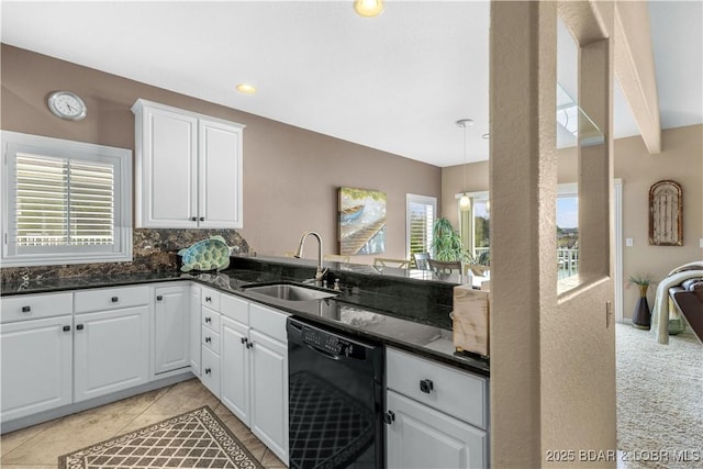 6680 Keystone Dr Unit 241, Osage Beach, MO 65065 - kitchen with dishwasher, white cabinets, backsplash, light tile patterned floors, and decorative light fixtures