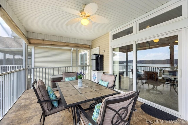 6680 Keystone Dr Unit 241, Osage Beach, MO 65065 - sunroom / solarium with ceiling fan and outdoor dining area