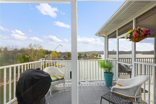 6680 Keystone Dr Unit 241, Osage Beach, MO 65065 - balcony featuring a grill and a water view