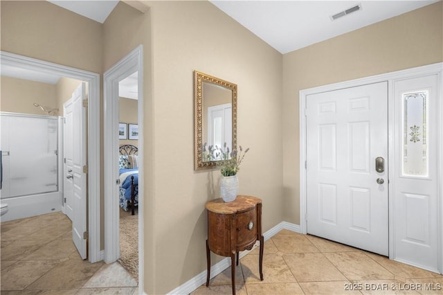 6680 Keystone Dr Unit 241, Osage Beach, MO 65065 - foyer with light tile patterned floors and baseboards