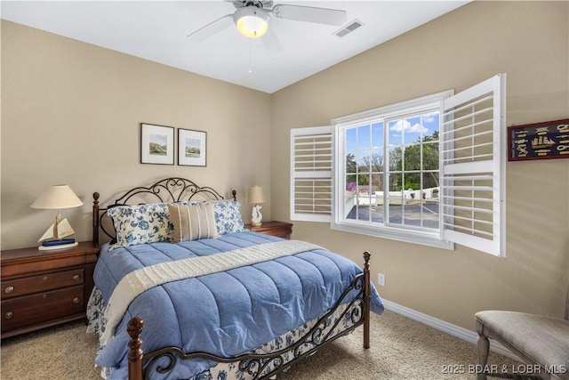 6680 Keystone Dr Unit 241, Osage Beach, MO 65065 - bedroom featuring carpet and a ceiling fan