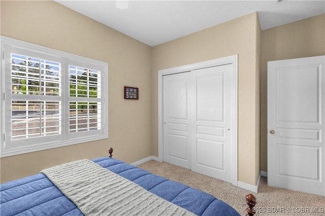 6680 Keystone Dr Unit 241, Osage Beach, MO 65065 - carpeted bedroom featuring baseboards and a closet