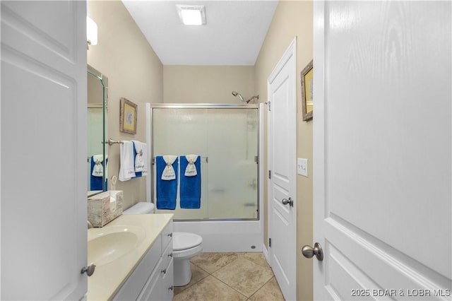 6680 Keystone Dr Unit 241, Osage Beach, MO 65065 - bathroom featuring vanity, shower / bath combination with glass door, and tile patterned floors