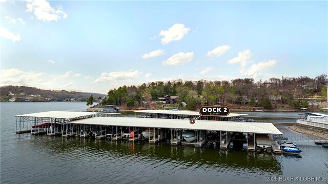 6680 Keystone Dr Unit 241, Osage Beach, MO 65065 - dock area with boat lift and a water view