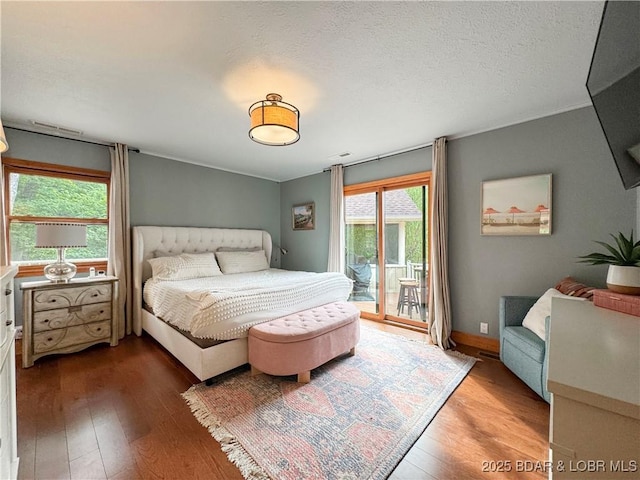 158 Oak Manor Cir, Sunrise Beach, MO 65079 - bedroom with hardwood / wood-style floors and access to exterior