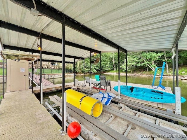 158 Oak Manor Cir, Sunrise Beach, MO 65079 - dock area featuring boat lift and a water view