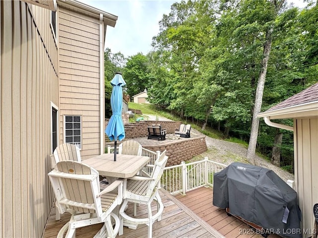 158 Oak Manor Cir, Sunrise Beach, MO 65079 - wooden terrace with outdoor dining area and grilling area