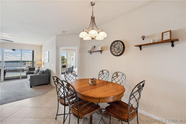 18136 Millstone Cove Rd Unit 136, Gravois Mills, MO 65037 - dining room featuring light colored carpet, a chandelier, and light tile patterned flooring